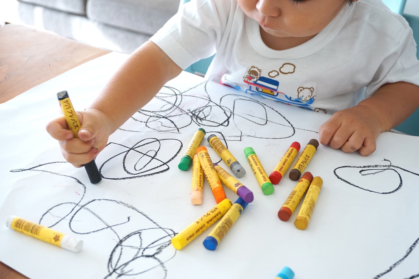 At preschool, little kids scribble their way to sharpening their fine motor skills, which are important for dexterity and writing too!