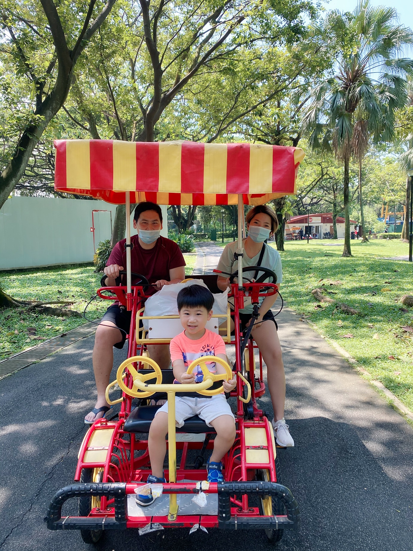 No prizes for guessing who’s enjoying the ride while my hubby and I were peddling away on our family day out!