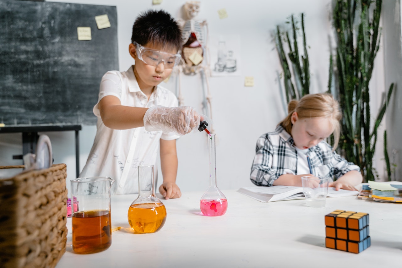 Singapore family benefits: Featuring two kids experiment something